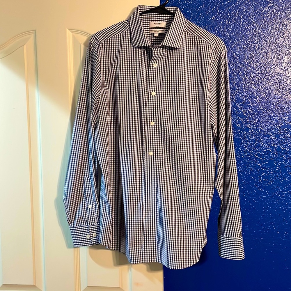 Dark blue and white dress shirt only worn once. Reason for selling: Doesn’t fit.